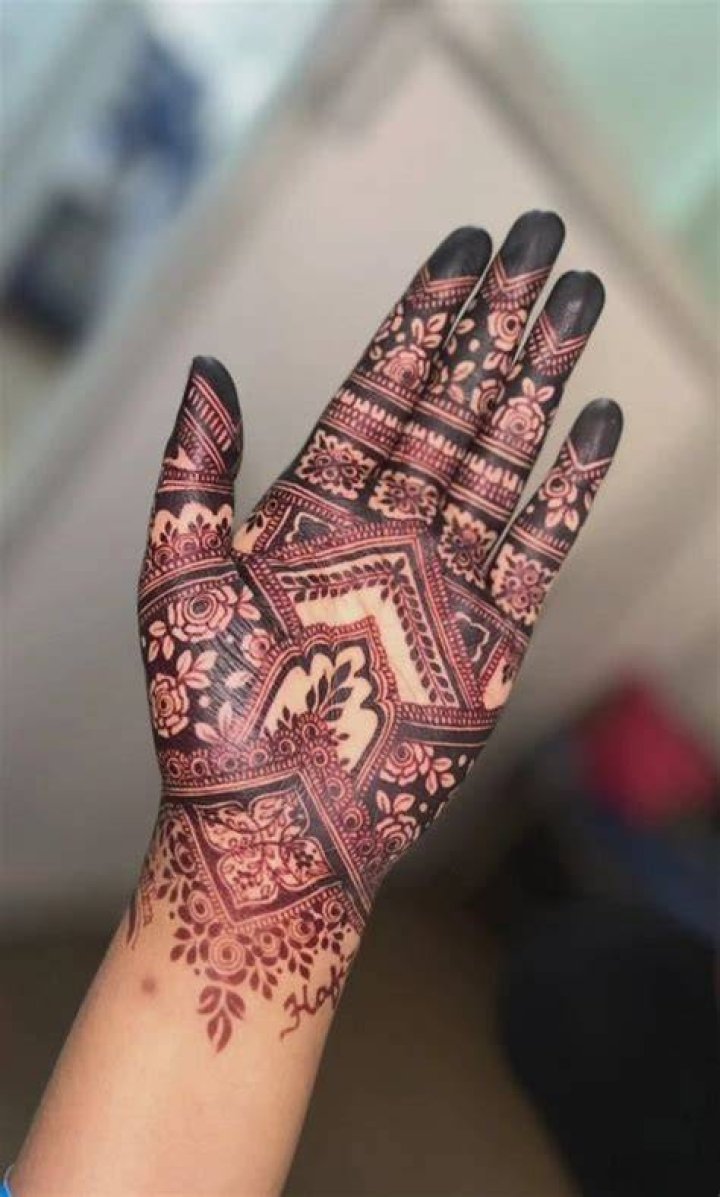 Red symmetry mehndi